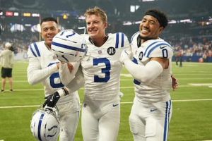 Pat McAfee celebrating with Indianapolis Colts teammates
